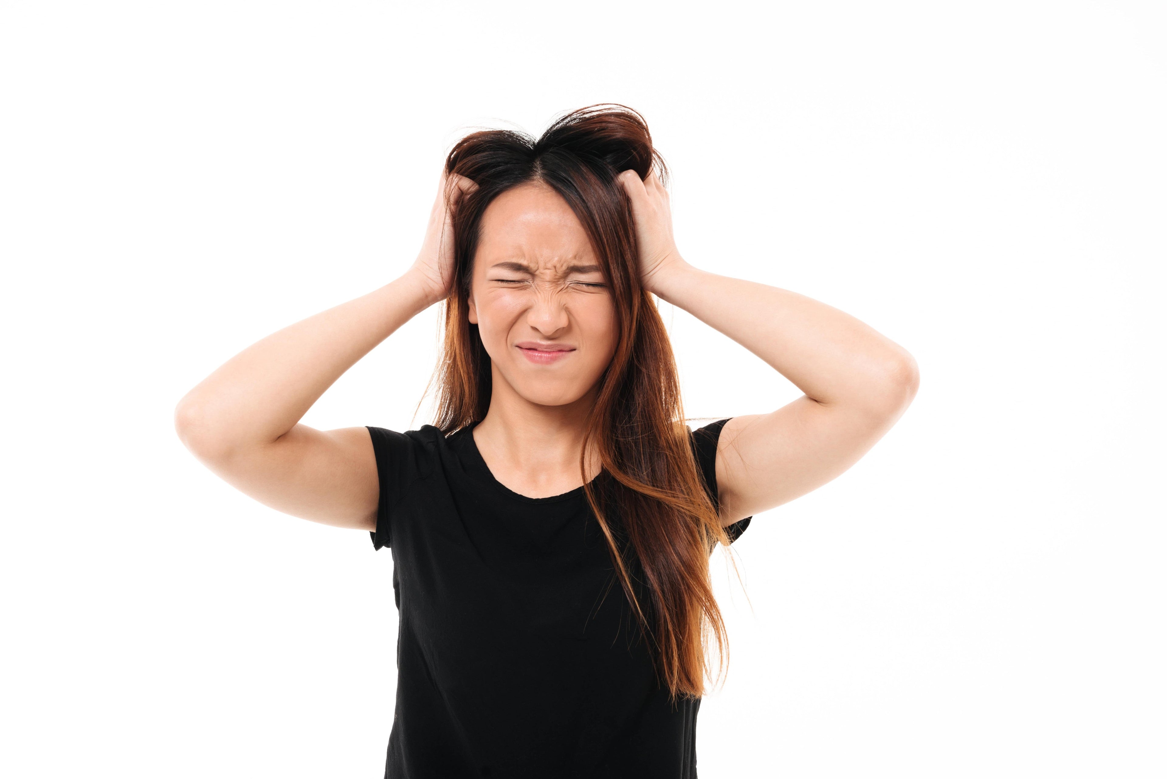 Overcoming Dandruff: 7 Reasons a Hair Tonic is Your Solution